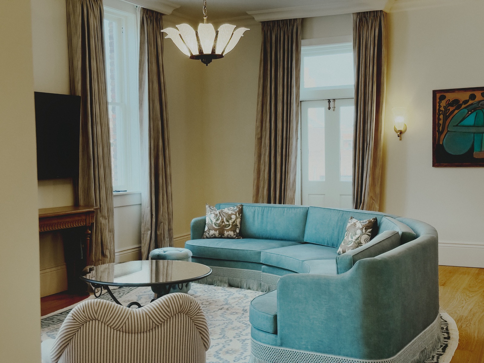 Warmly furnished living space with upholstered seating